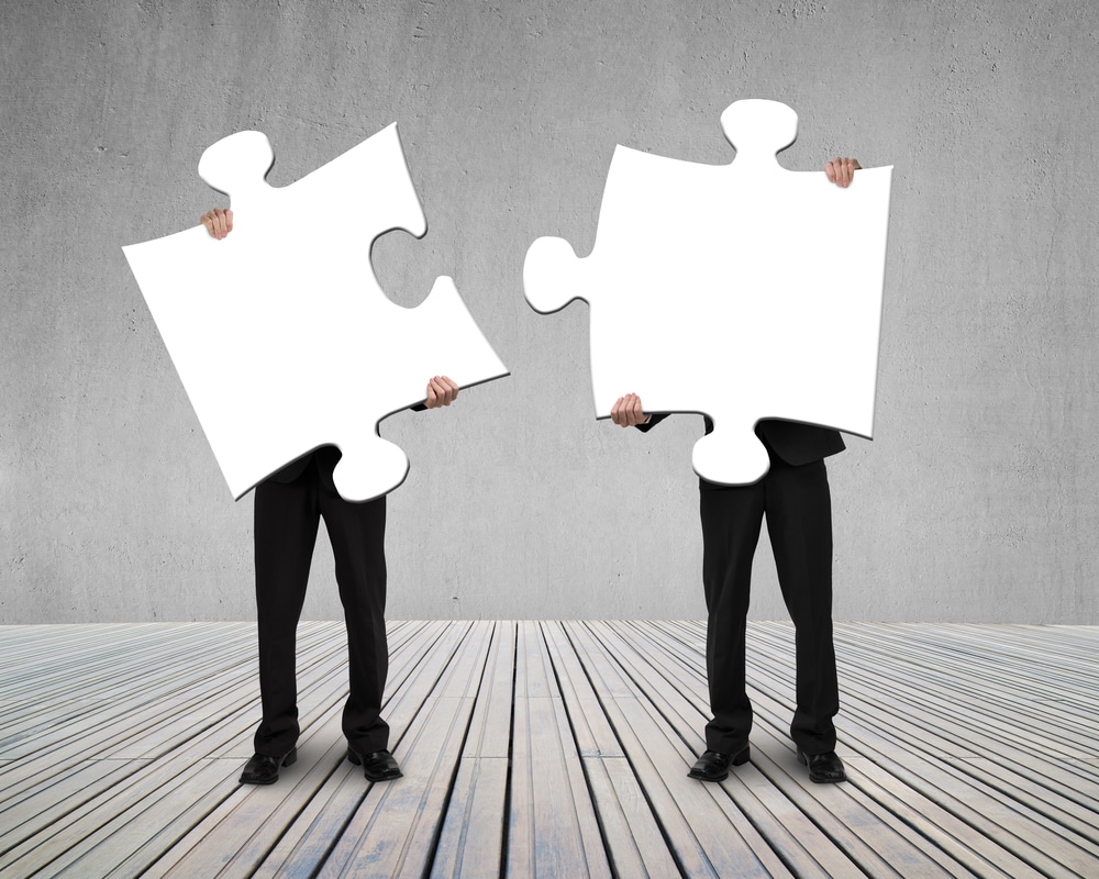 Businessmen matching social media and SEO puzzle pieces, social media marketing, Houston, TX Social Media and SEO: A Perfect Match For Business Marketing, Social Media Marketing, ITVibes, Houston, TX